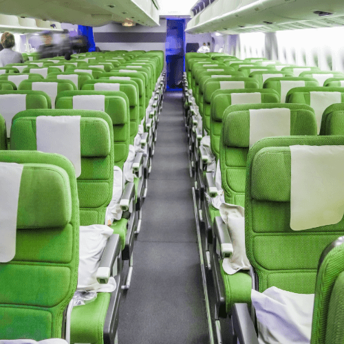 Row of green seats in a plane